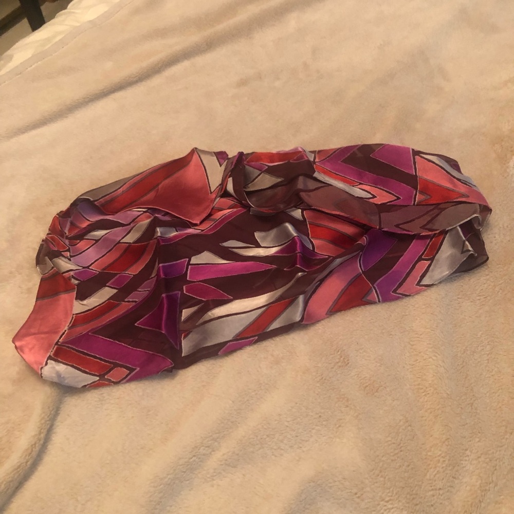 Two scarves. One burgundy. One in maroon/pink line